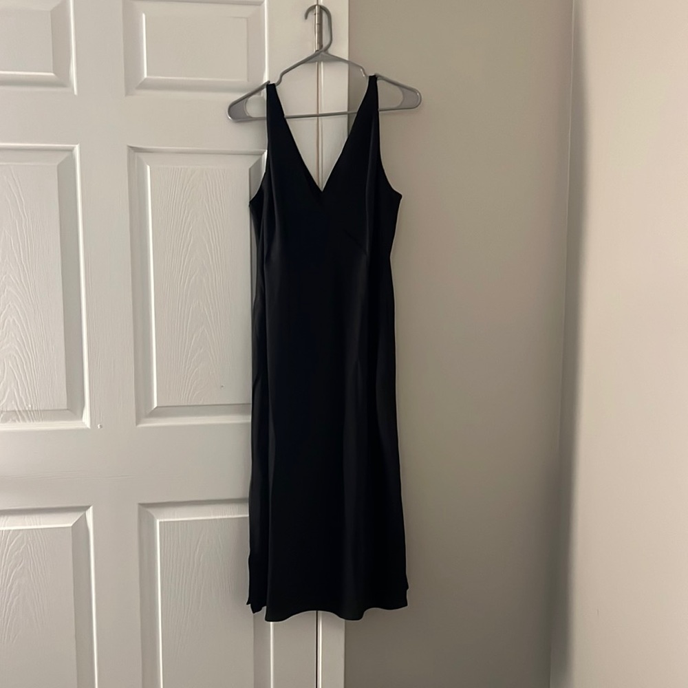 Loose black light weight v neck dress with side slits